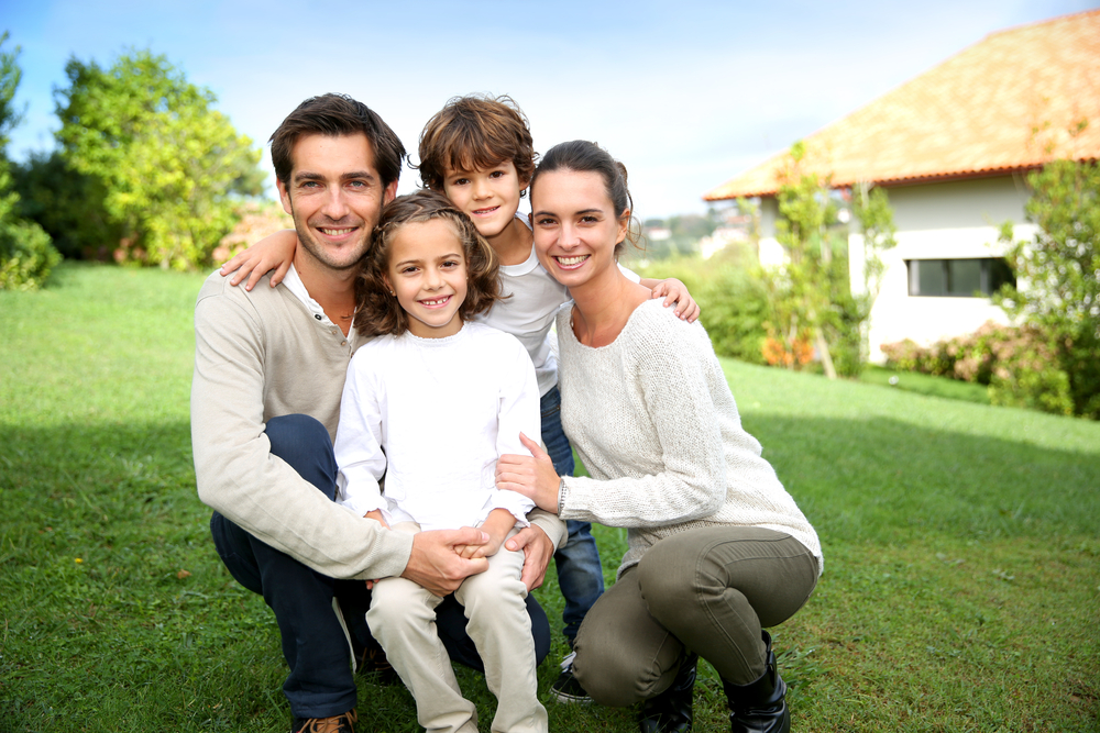 Cute family portrait of 4 people Cute family portrait of 4 people